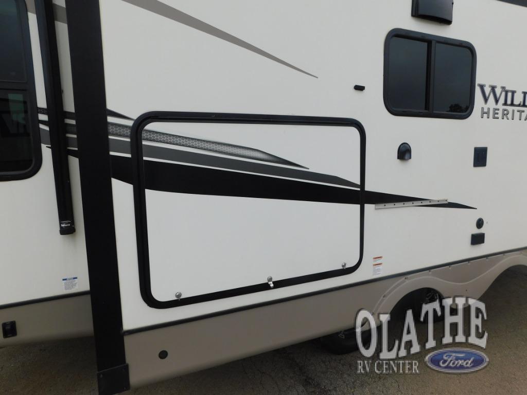 A photo of this 2023 Forest River Rv WILDWOOD HERITAGE GLEN