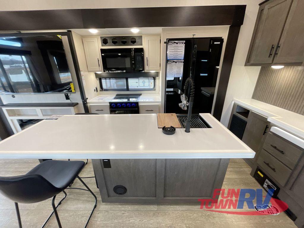 A photo of this 2025 Forest River RV Cherokee Arctic Wolf Suite 3800DECK