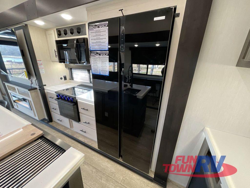A photo of this 2025 Forest River RV Cherokee Arctic Wolf Suite 3800DECK