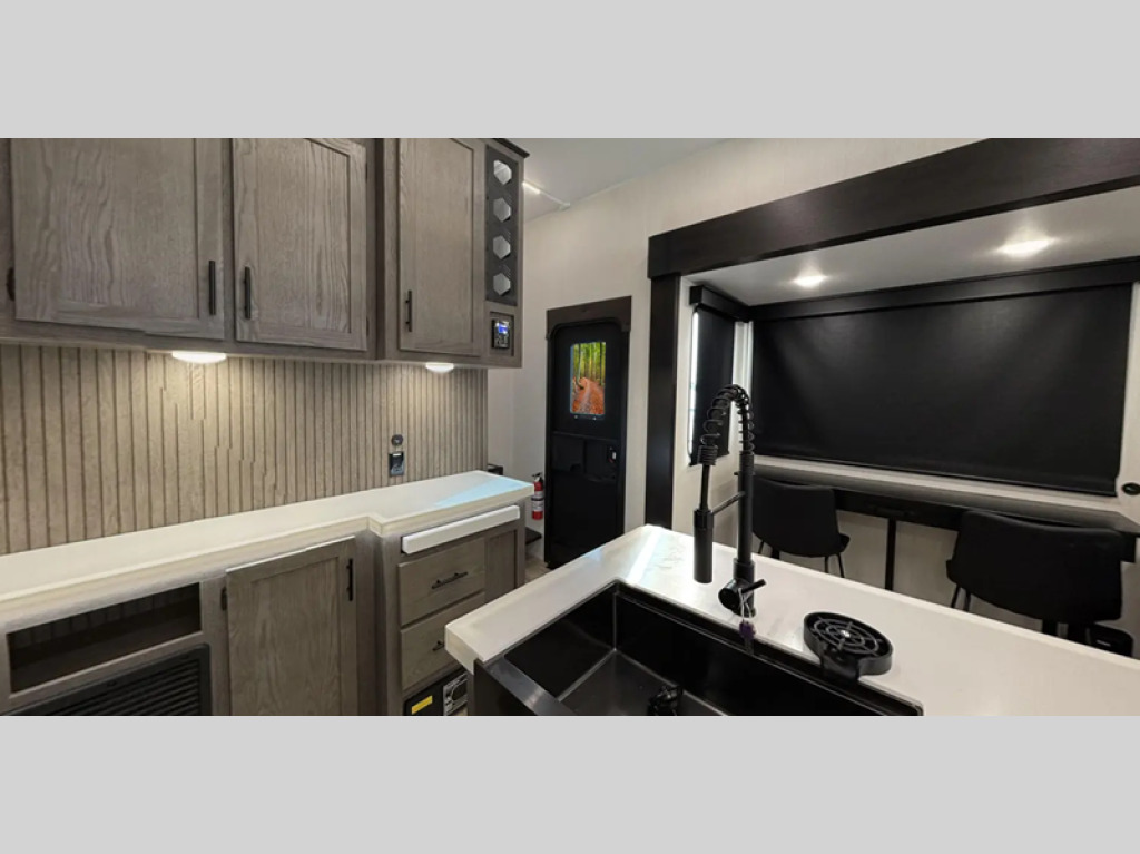 A photo of this 2025 Forest River RV Cherokee Arctic Wolf Suite 3800DECK